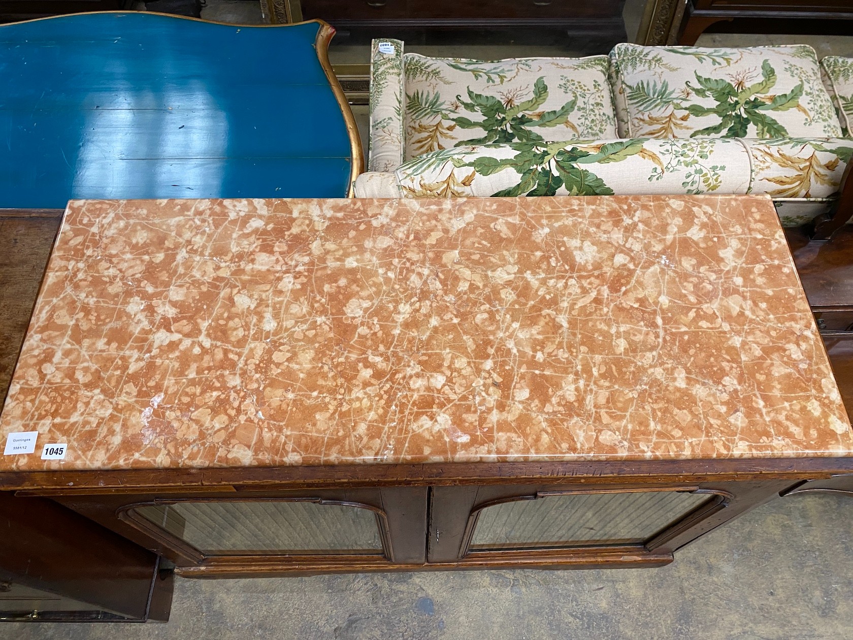 A Victorian marble top two door side cabinet, width 126cm, depth 49cm, height 93cm